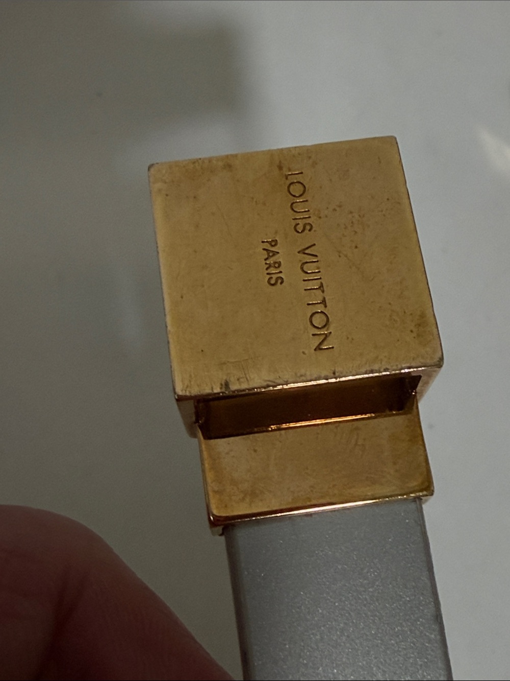 Louis Vuitton Gold and Silver skinny belt length and width are pictured/ sized L